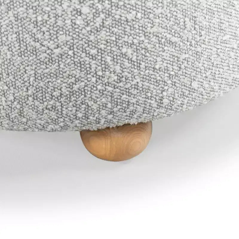 Pouf contenitore rotondo in bouclé Becka