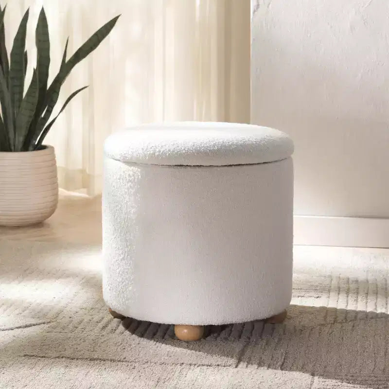 Pouf contenitore rotondo in bouclé Becka