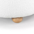 Pouf contenitore rotondo in bouclé Becka